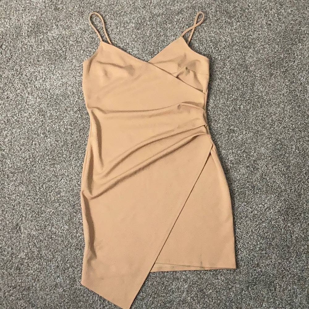 Fairly new beige tight dress.
